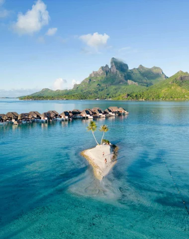 Bungalow on stilts in Bora Bora © Flying World Pictures